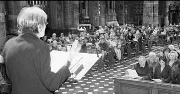 Il pubblico segue in basilica la serata dantesca; sotto, Giovanni dal Covolo e Aide Bosio