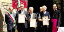 La premiazione di Mons. Marino Bertocchi, don Ettore persico e Don Davide Pelucchi