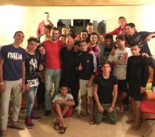 Don Burgio con i ragazzi della comunità Kayros